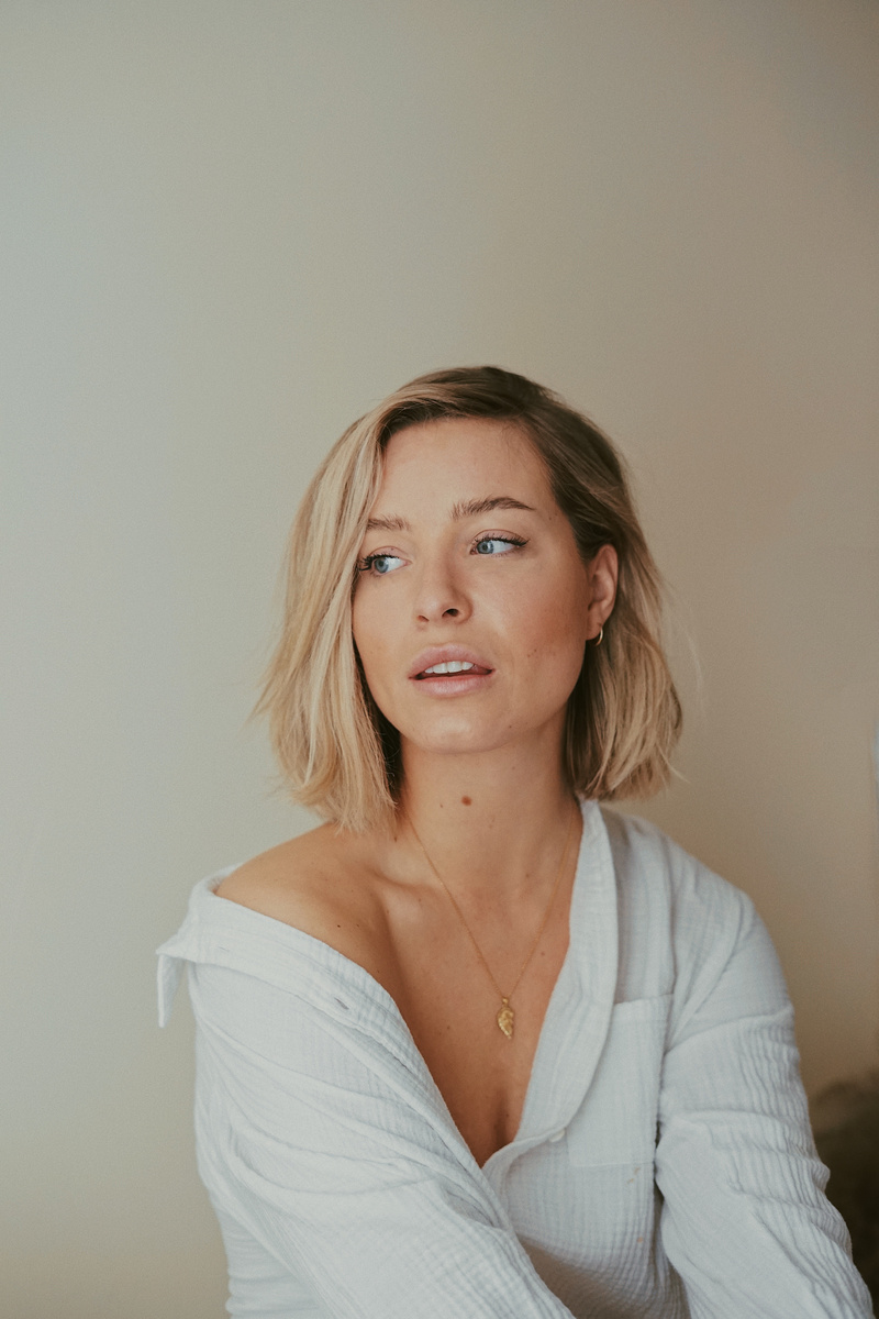 Beautiful Woman in White Long Sleeve Shirt